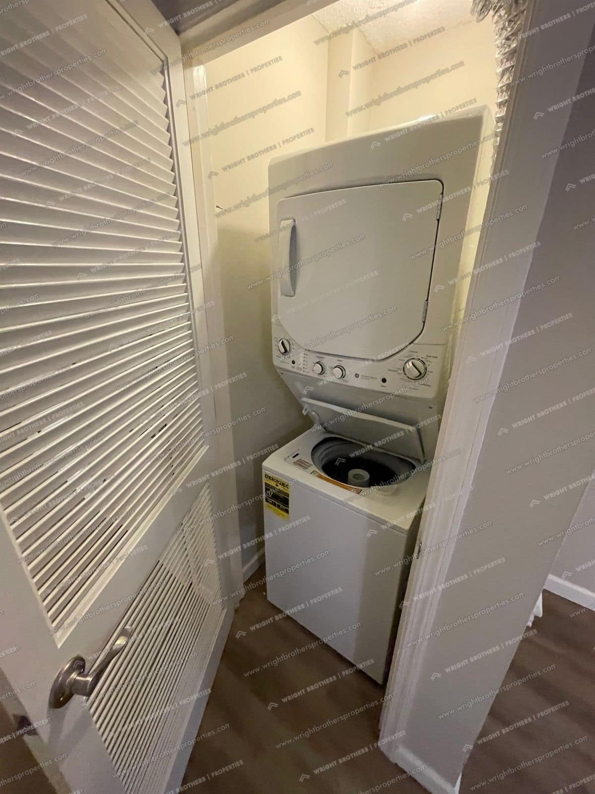 In-unit stacked washer and dryer