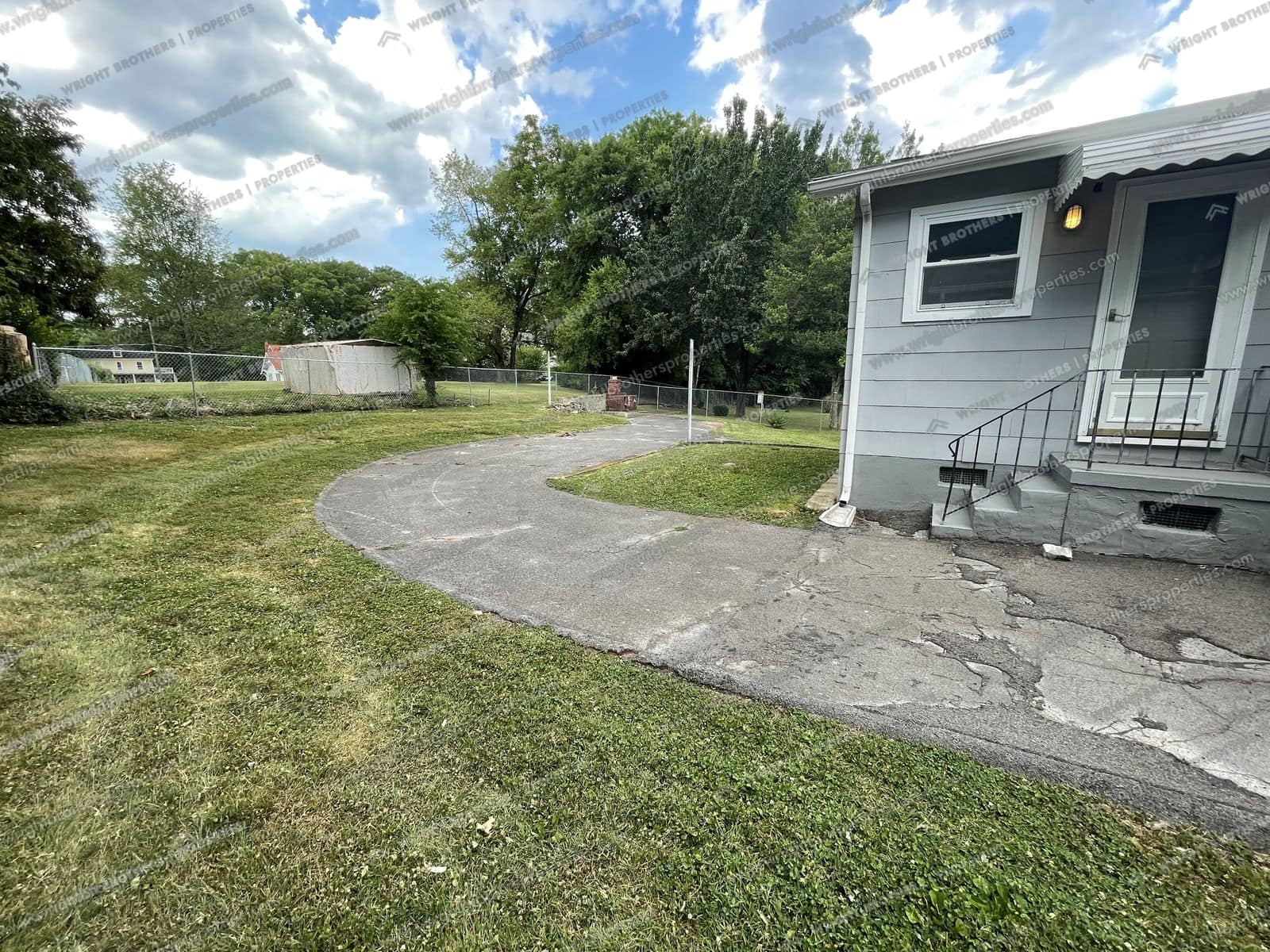 Side yard and driveway